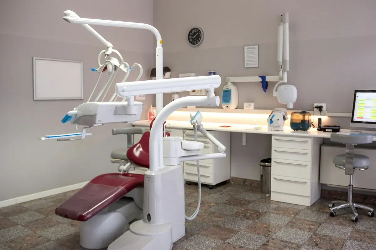 Dental treatment room with an empty chair
